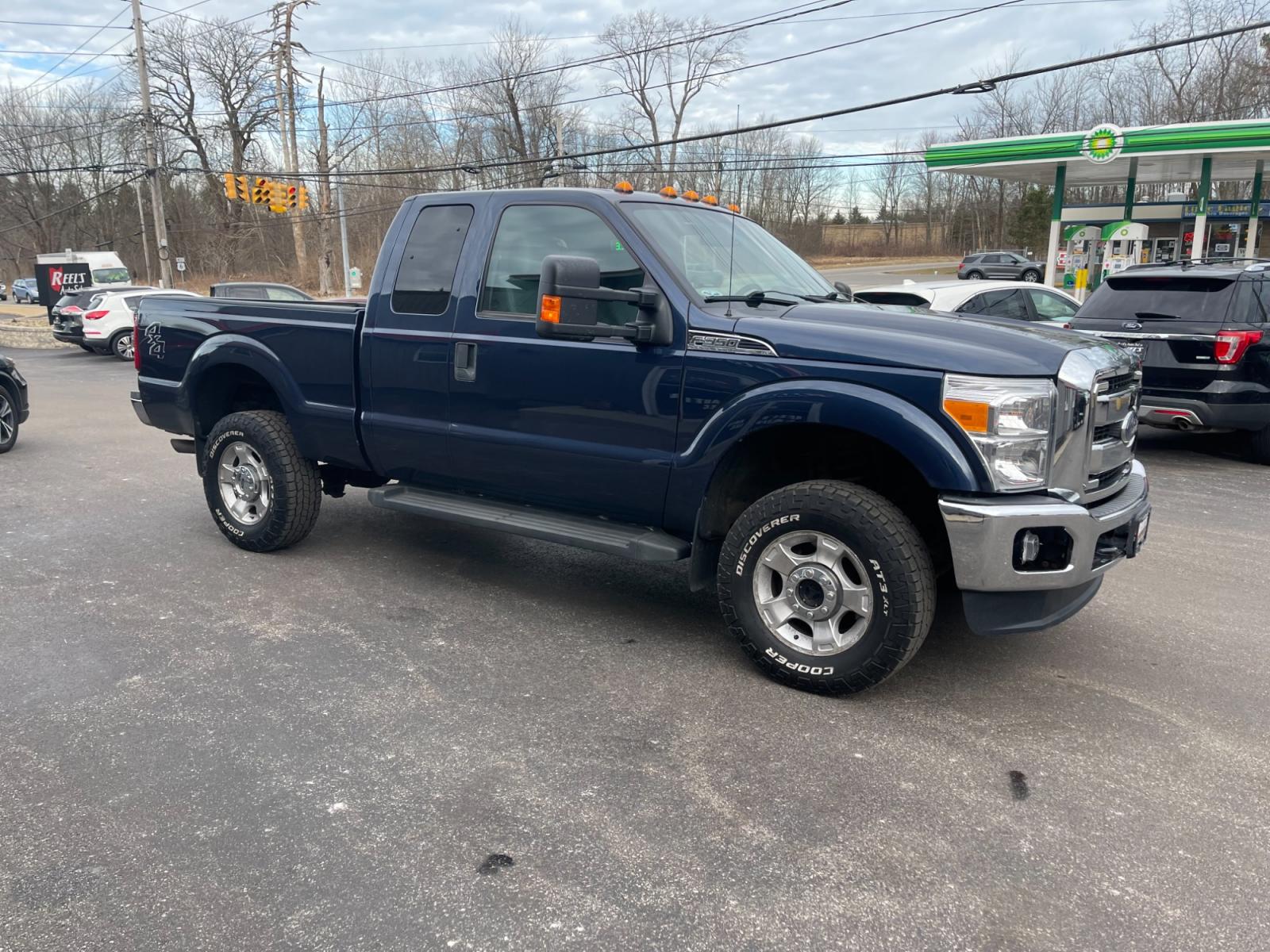2015 Blue /Gray Ford F-350 SD XLT SuperCab Long Bed 4WD (1FT8X3B68FE) with an 6.2L V8 OHV 16V engine, 6-Speed Automatic transmission, located at 11115 Chardon Rd. , Chardon, OH, 44024, (440) 214-9705, 41.580246, -81.241943 - This 2015 Ford F-350 XLT Supercab 4WD, equipped with a robust 6.2L V8 engine and a 6-speed automatic transmission, offers substantial power and capability, suited for both work and recreational towing needs. It ensures driver comfort with a power driver's seat and power-adjustable pedals, coupled wi - Photo #3